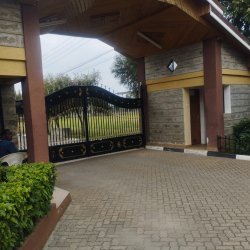 A five bedroom all ensuites bungalow with staff quarters for two in a gated community and good neighborhood.
