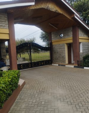 A five bedroom all ensuites bungalow with staff quarters for two in a gated community and good neighborhood.