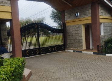 A five bedroom all ensuites bungalow with staff quarters for two in a gated community and good neighborhood.
